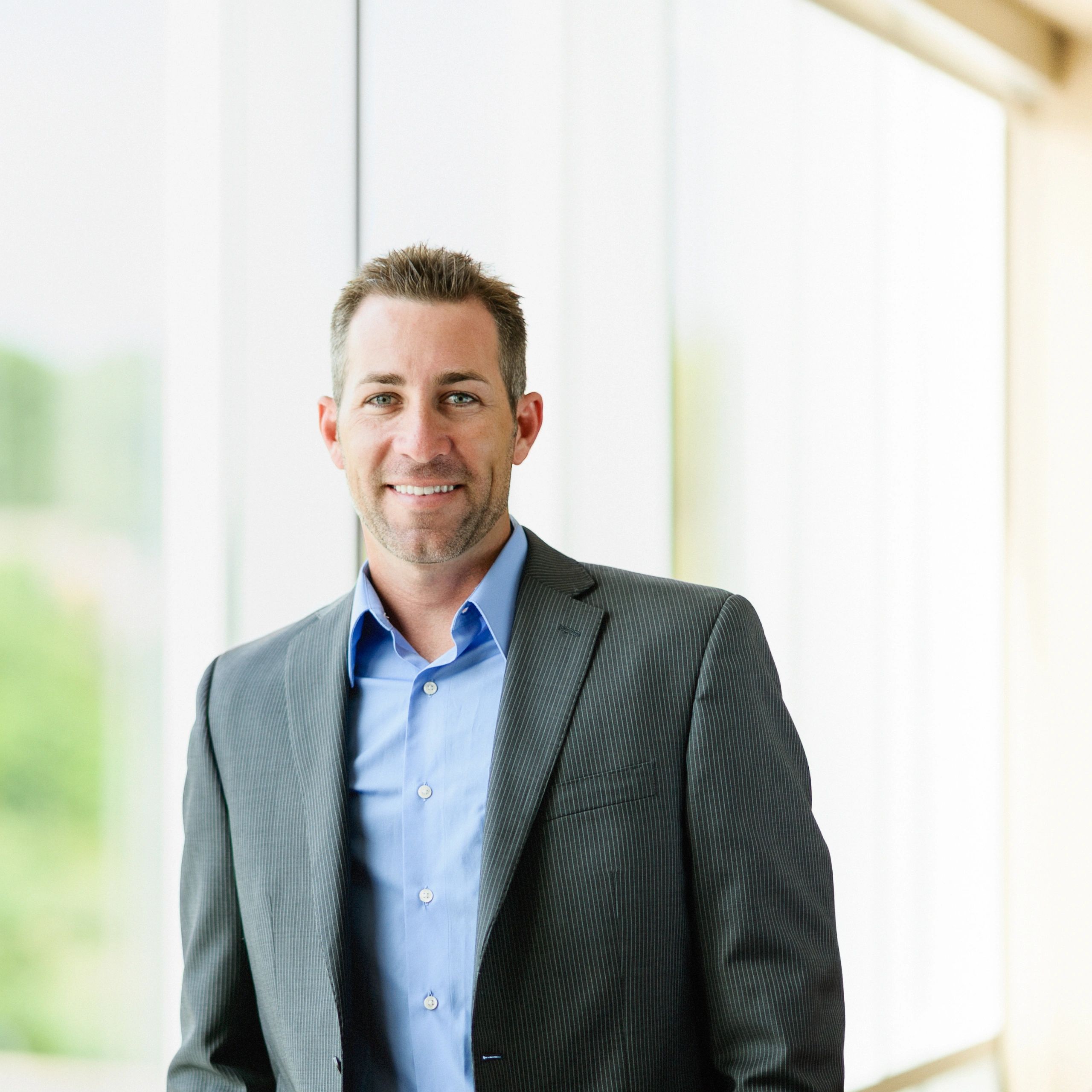 Professional advisor portrait representing market development