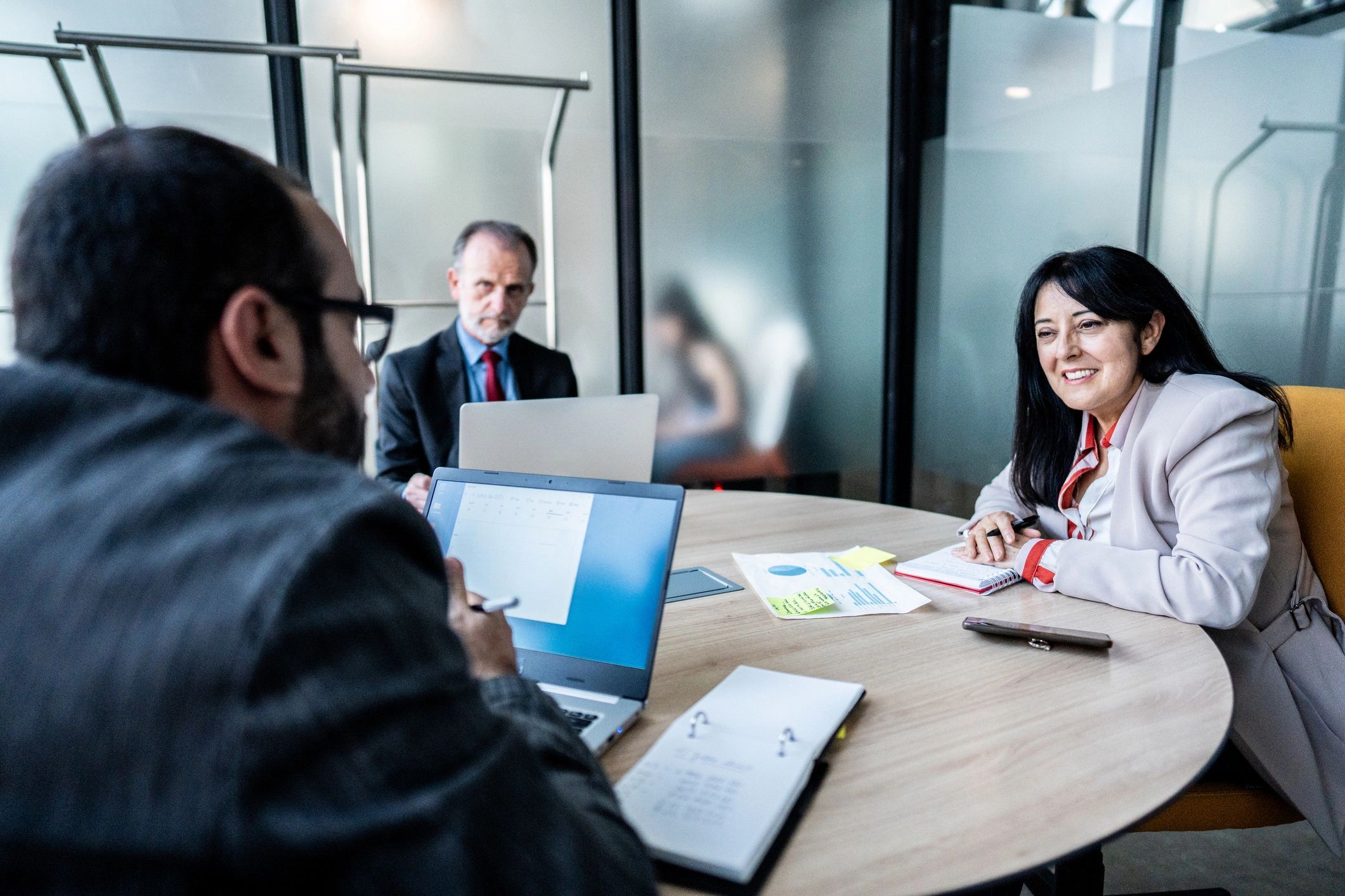 Business colleagues in conversation during a meeting