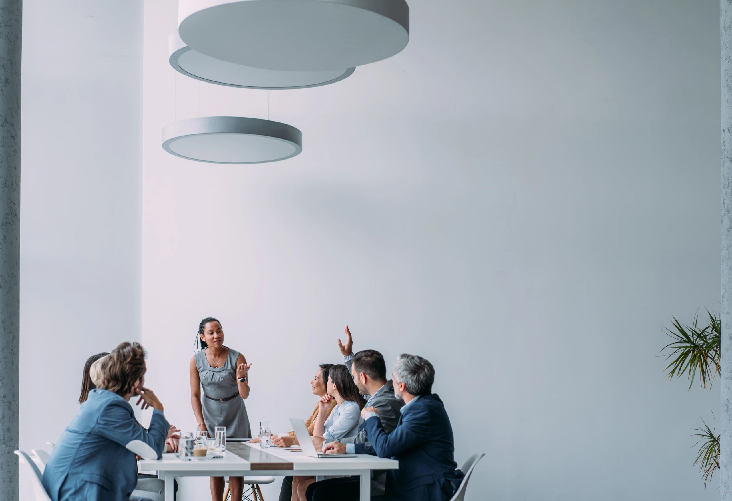 Professionals collaborating during a corporate strategy meeting