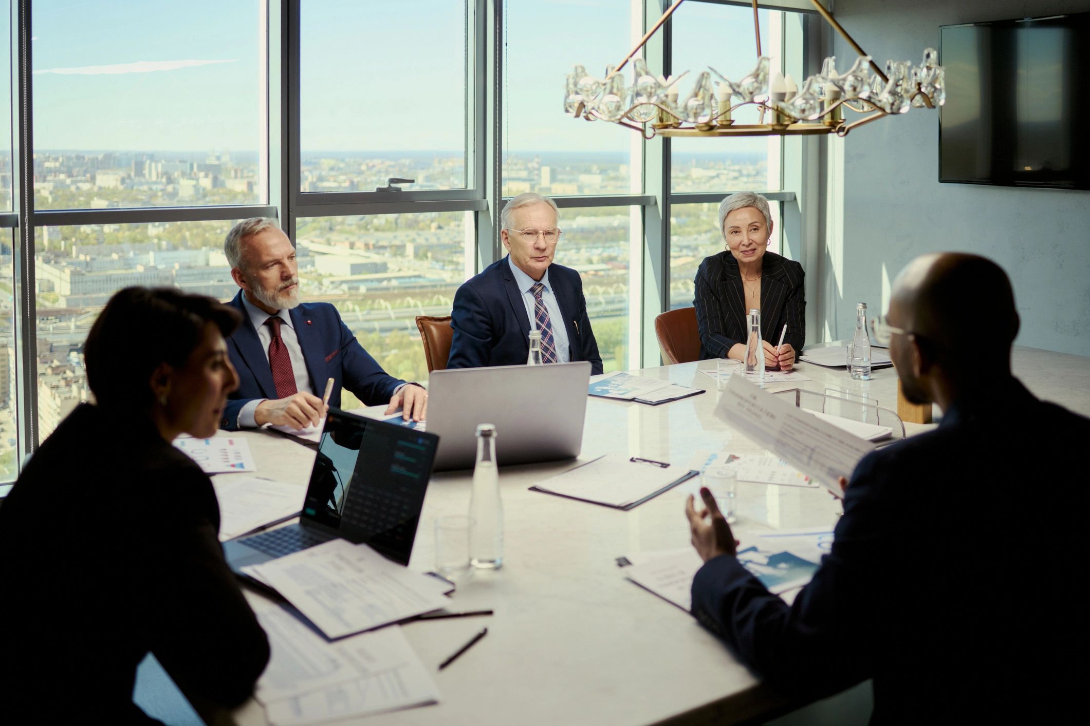 Business leaders reviewing strategy in a boardroom